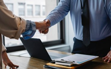 Handshake symbolizing the agreement and guidelines outlined in Will's Time